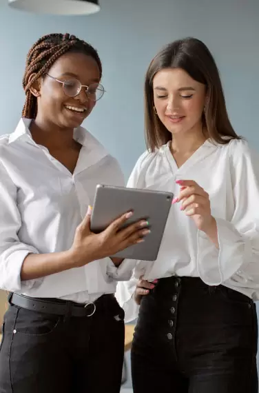 low view confident woman holding camera